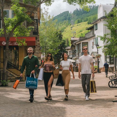 A sunny alpine street with friends walking and carrying shopping bags, framed by trees and cable cars in the mountains.
